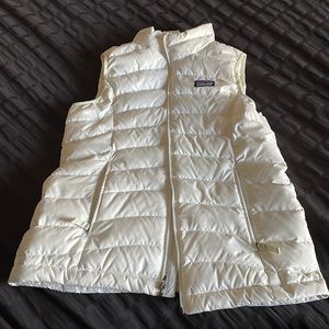 white puffy patagonia vest